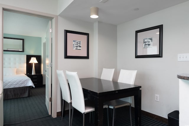 107 S Ocean Blvd Unit 704, Myrtle Beach, SC 29577 - dining space featuring carpet flooring and baseboards