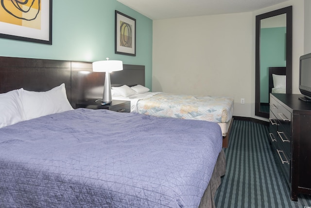 107 S Ocean Blvd Unit 704, Myrtle Beach, SC 29577 - bedroom with dark colored carpet