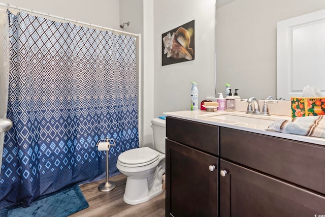 2848 Ophelia Way, Myrtle Beach, SC 29577 - bathroom with wood finished floors, toilet, vanity, and curtained shower