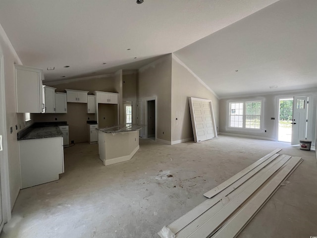2929 Hughes Gasque Rd, Aynor, SC 29511 - unfurnished living room featuring lofted ceiling and baseboards