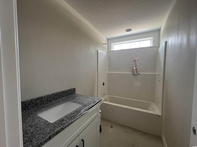 2929 Hughes Gasque Rd, Aynor, SC 29511 - bathroom featuring a textured ceiling, vanity, and bathing tub / shower combination