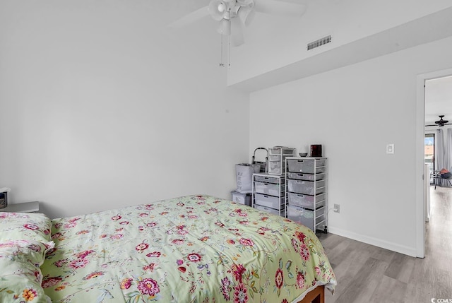 500 Fairway Village Dr Unit 7-D, Myrtle Beach, SC 29588 - bedroom featuring wood finished floors, a ceiling fan, and baseboards