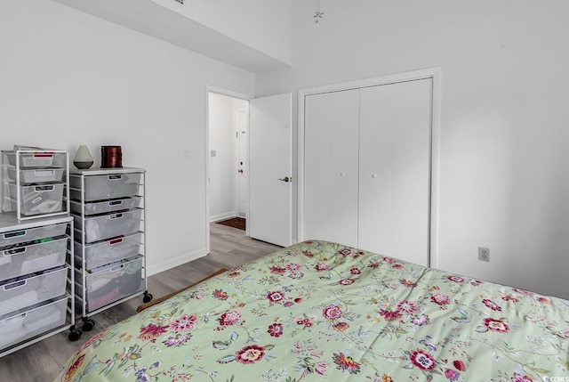 500 Fairway Village Dr Unit 7-D, Myrtle Beach, SC 29588 - bedroom with wood finished floors, a closet, and baseboards