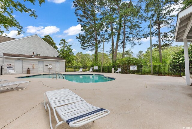 500 Fairway Village Dr Unit 7-D, Myrtle Beach, SC 29588 - community pool featuring a patio