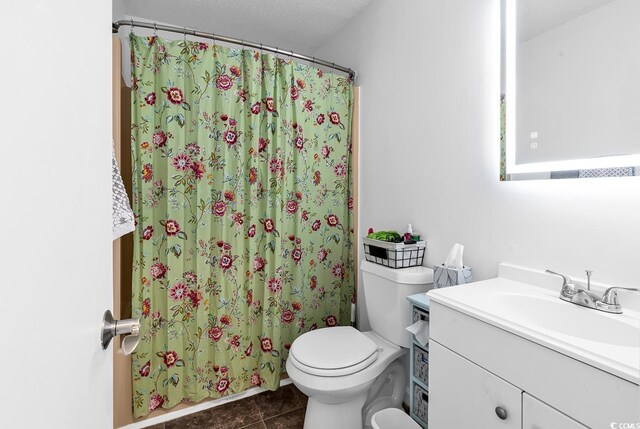 500 Fairway Village Dr Unit 7-D, Myrtle Beach, SC 29588 - bathroom with vanity, toilet, tile patterned floors, and curtained shower