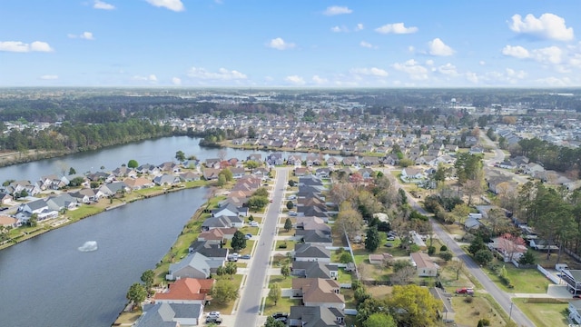 birds eye view of property featuring a residential view and a water view