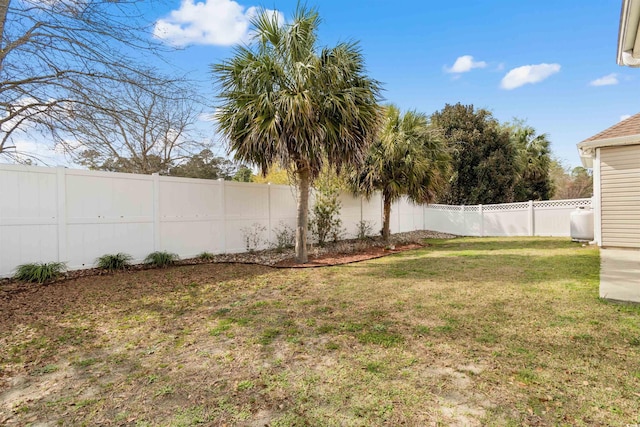 view of yard featuring a fenced backyard