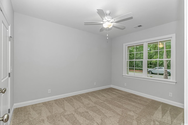 19 Coventry Pl, Pawleys Island, SC 29585 - carpeted spare room with baseboards and ceiling fan
