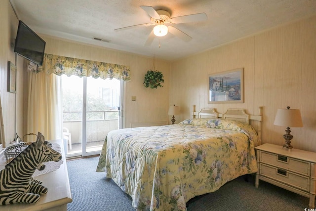 carpeted bedroom with access to outside, ceiling fan, and visible vents