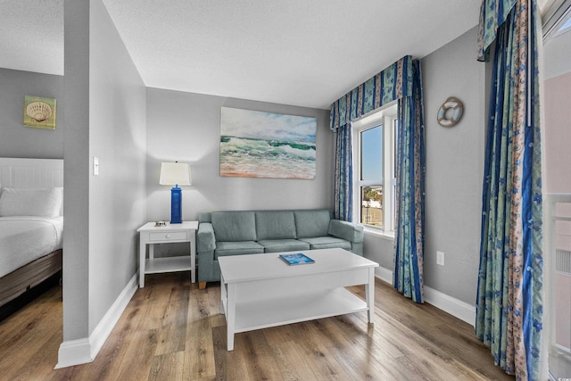 2801 S Ocean Blvd # 231, North Myrtle Beach, SC 29582 - sitting room with wood finished floors and baseboards