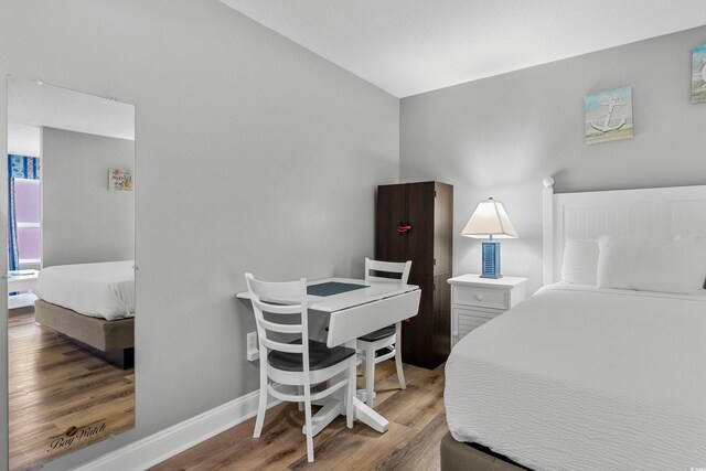 2801 S Ocean Blvd # 231, North Myrtle Beach, SC 29582 - bedroom with wood finished floors and baseboards