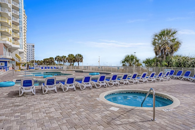 2801 S Ocean Blvd # 231, North Myrtle Beach, SC 29582 - community pool featuring a patio and a community hot tub