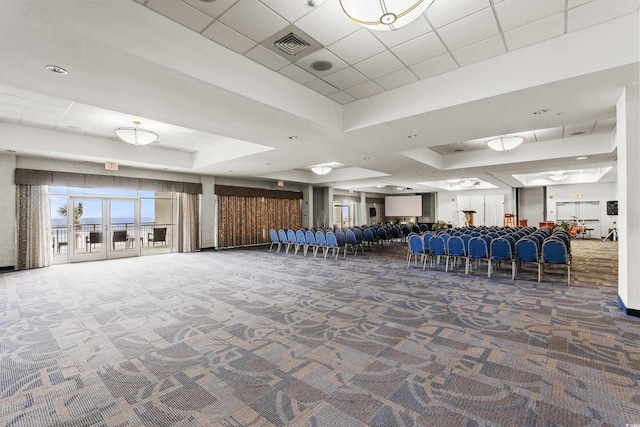 2801 S Ocean Blvd # 231, North Myrtle Beach, SC 29582 - misc room with visible vents, carpet floors, and a tray ceiling