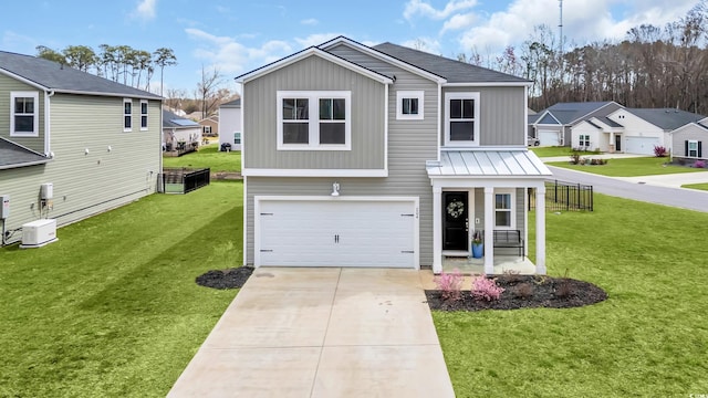 204 Leaflet Loop, Pawleys Island, SC 29585 - view of front of house featuring a garage, a front yard, driveway, and a residential view