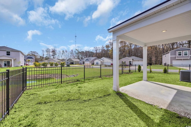 204 Leaflet Loop, Pawleys Island, SC 29585 - view of yard featuring a residential view, central AC, and a patio