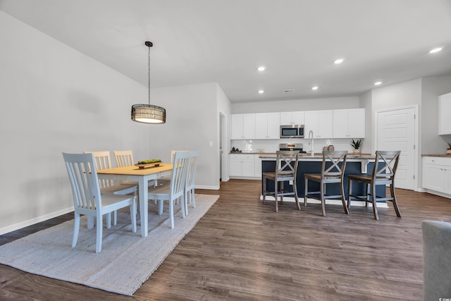 204 Leaflet Loop, Pawleys Island, SC 29585 - dining area featuring recessed lighting, dark wood-style floors, and baseboards