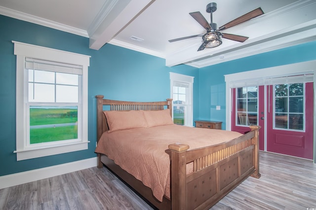 224 Oak Bay Dr, Georgetown, SC 29440 - bedroom featuring beamed ceiling, wood finished floors, ornamental molding, ceiling fan, and baseboards
