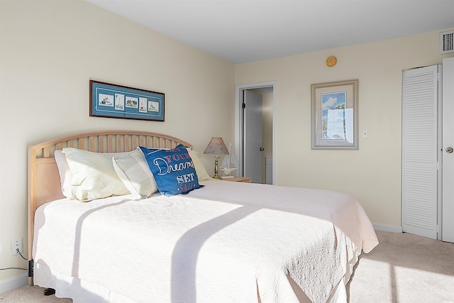 601 Mitchell Dr Unit 801, Myrtle Beach, SC 29577 - bedroom with baseboards, visible vents, and carpet