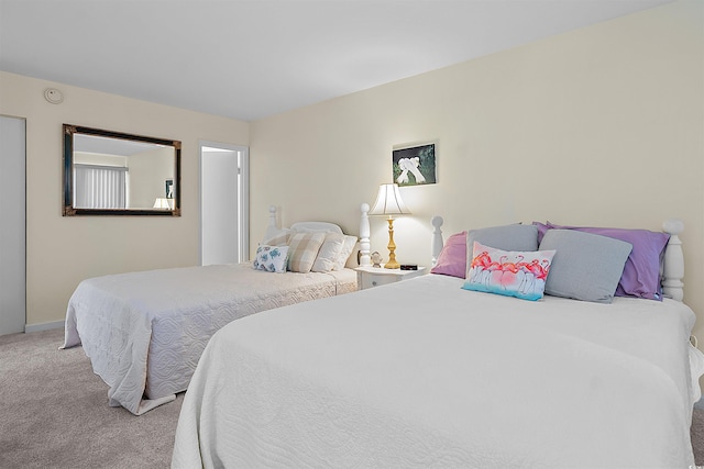 601 Mitchell Dr Unit 801, Myrtle Beach, SC 29577 - carpeted bedroom featuring baseboards