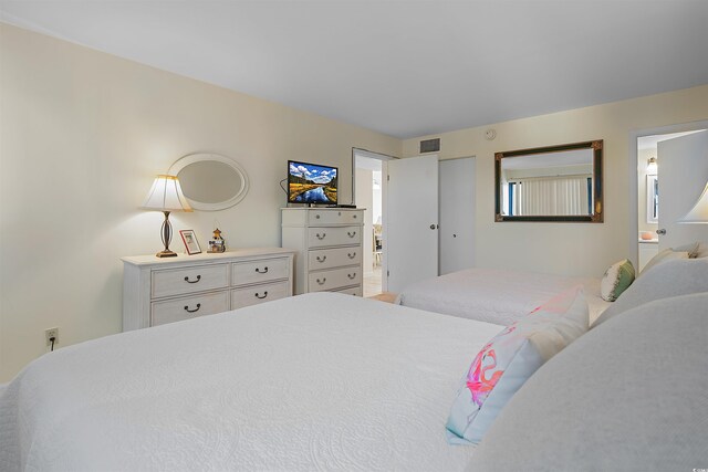 601 Mitchell Dr Unit 801, Myrtle Beach, SC 29577 - bedroom with connected bathroom and visible vents