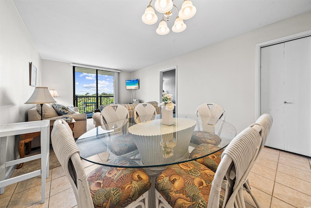 601 Mitchell Dr Unit 801, Myrtle Beach, SC 29577 - dining room featuring light tile patterned flooring and a notable chandelier