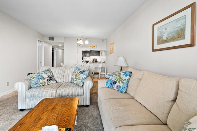 601 Mitchell Dr Unit 801, Myrtle Beach, SC 29577 - living room with carpet floors, baseboards, a notable chandelier, and visible vents