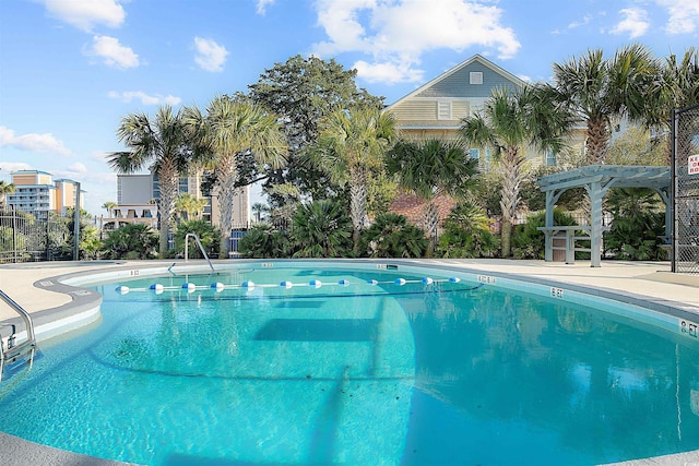 601 Mitchell Dr Unit 801, Myrtle Beach, SC 29577 - pool featuring a pergola and fence