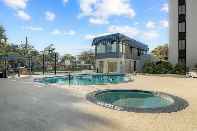 601 Mitchell Dr Unit 801, Myrtle Beach, SC 29577 - community pool featuring a hot tub, fence, and a patio area