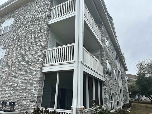4639 Wild Iris Dr Unit 43-204, Myrtle Beach, SC 29577 - view of property exterior with a balcony and central AC