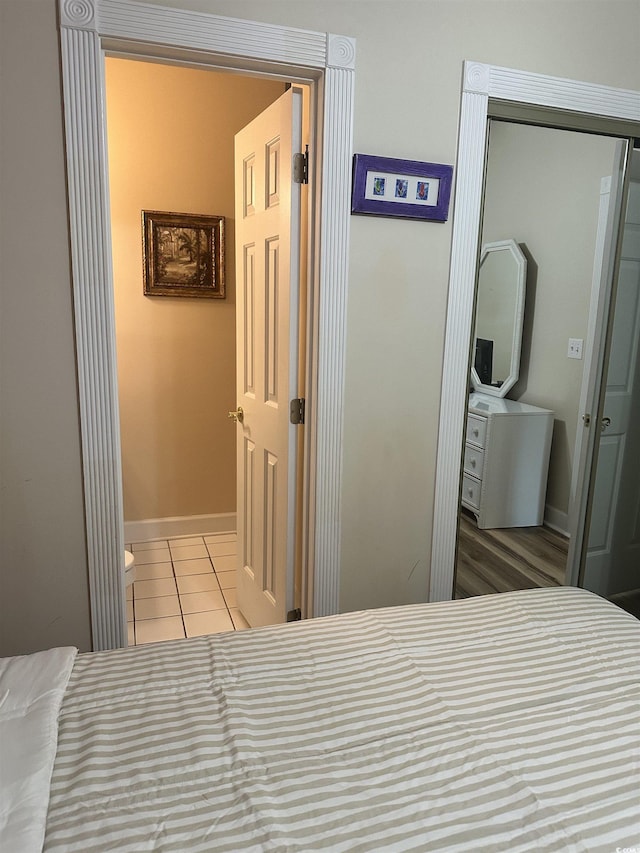 4639 Wild Iris Dr Unit 43-204, Myrtle Beach, SC 29577 - bedroom with tile patterned floors, baseboards, and a closet