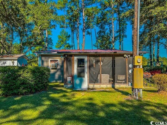 3641 Half Pint Rd, Longs, SC 29568 - view of outdoor structure featuring a sunroom and cooling unit