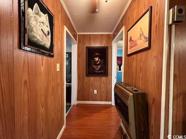 3641 Half Pint Rd, Longs, SC 29568 - hallway with ornamental molding, wooden walls, wood finished floors, and heating unit