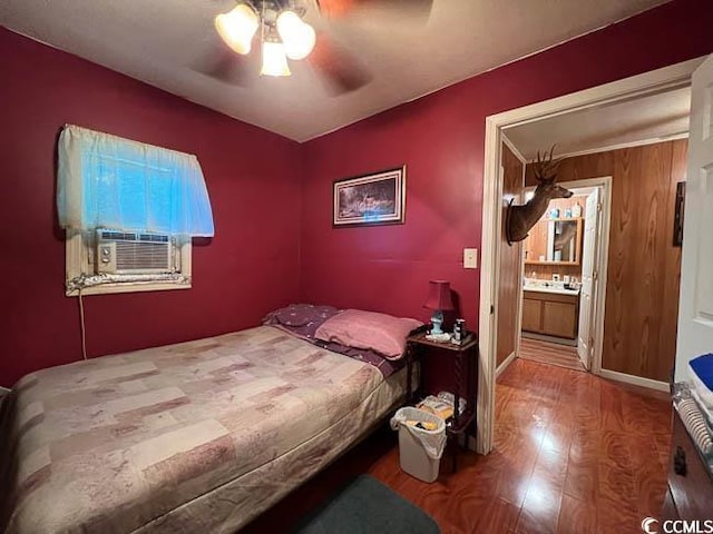 3641 Half Pint Rd, Longs, SC 29568 - bedroom featuring wood finished floors, cooling unit, a ceiling fan, and ensuite bathroom
