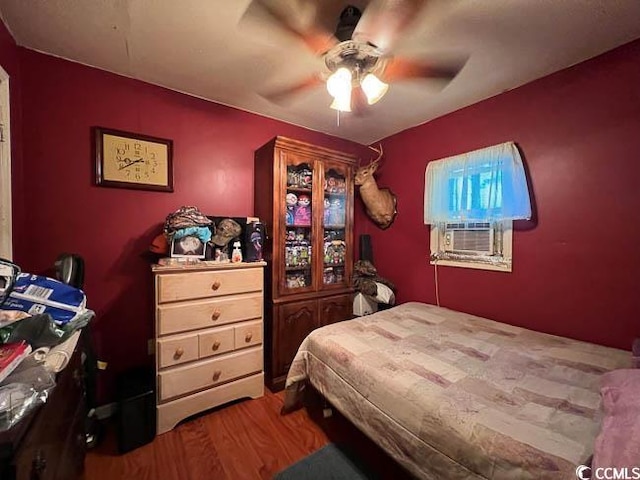 3641 Half Pint Rd, Longs, SC 29568 - bedroom with wood finished floors and a ceiling fan