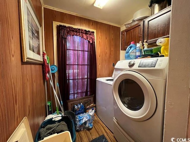 3641 Half Pint Rd, Longs, SC 29568 - washroom with washer and clothes dryer, cabinet space, wood walls, and wood finished floors