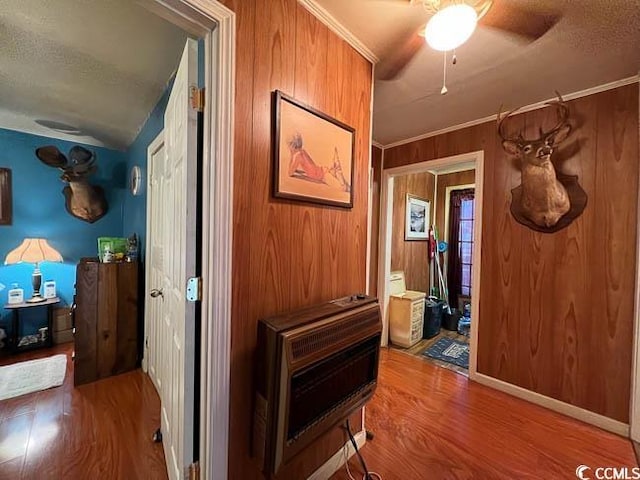 3641 Half Pint Rd, Longs, SC 29568 - hall featuring wood finished floors, wood walls, and heating unit