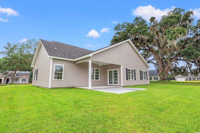 72 Millsite Ct, Georgetown, SC 29440 - rear view of property with ceiling fan, a patio area, roof with shingles, and a lawn