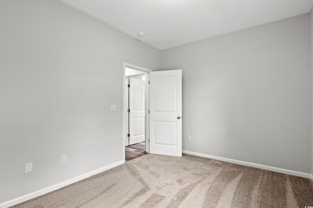 72 Millsite Ct, Georgetown, SC 29440 - carpeted empty room with baseboards and a smoke detector