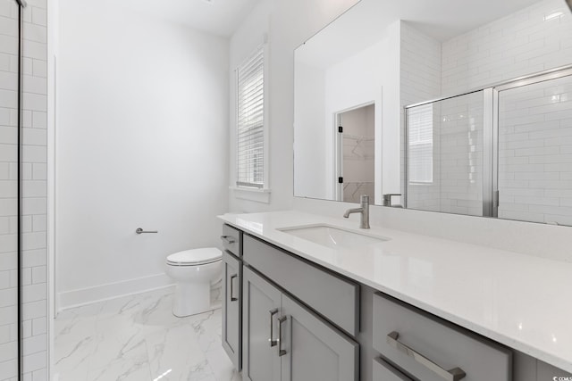 full bath featuring marble look tiles, toilet, a stall shower, vanity, and baseboards