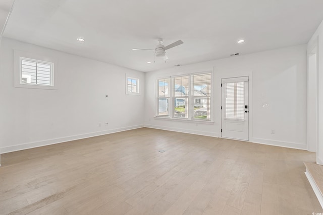 unfurnished living room featuring a ceiling fan, recessed lighting, baseboards, and light wood-style floors
