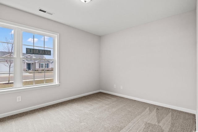 235 Six Mile Creek Dr, Georgetown, SC 29440 - spare room with baseboards, visible vents, and carpet floors