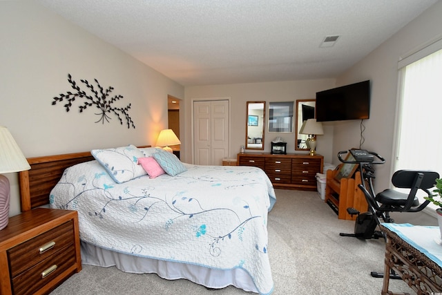4242 Pinehurst Cir Unit N4, Little River, SC 29566 - bedroom with a closet and light carpet