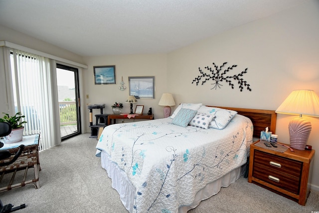 4242 Pinehurst Cir Unit N4, Little River, SC 29566 - bedroom featuring light carpet and access to outside