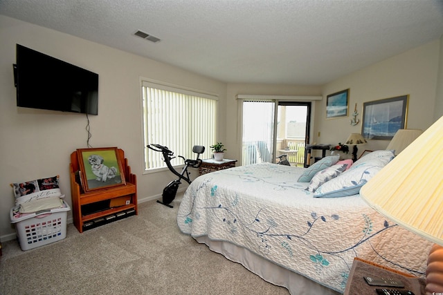 4242 Pinehurst Cir Unit N4, Little River, SC 29566 - carpeted bedroom featuring access to outside and baseboards