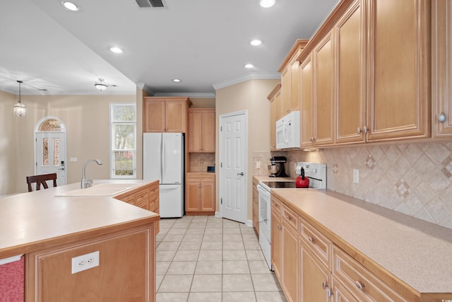 192 Berkshire Loop, Pawleys Island, SC 29585 - kitchen with white appliances, a sink, recessed lighting, light tile patterned floors, and light countertops
