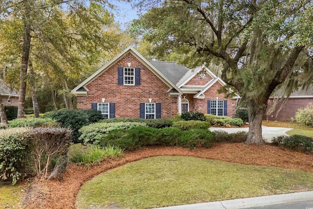 192 Berkshire Loop, Pawleys Island, SC 29585 - view of front of property with brick siding and a front yard