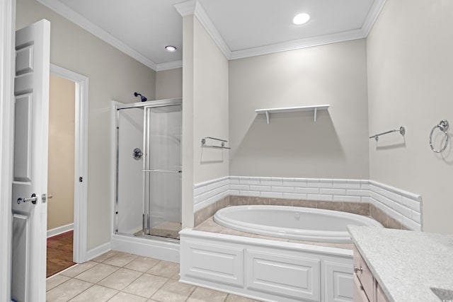 192 Berkshire Loop, Pawleys Island, SC 29585 - bathroom with a stall shower, ornamental molding, a bath, tile patterned floors, and vanity