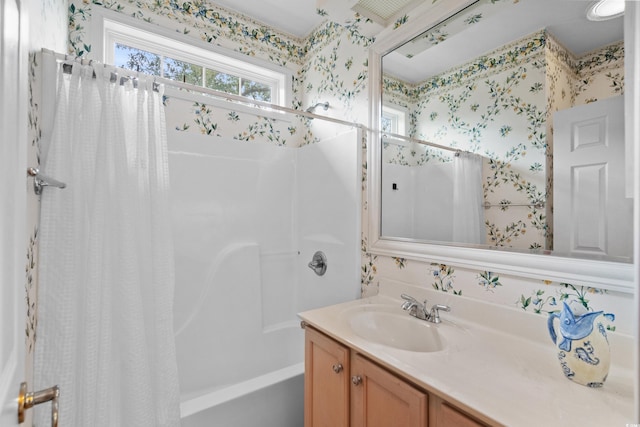192 Berkshire Loop, Pawleys Island, SC 29585 - full bath with wallpapered walls, shower / bathtub combination with curtain, and vanity