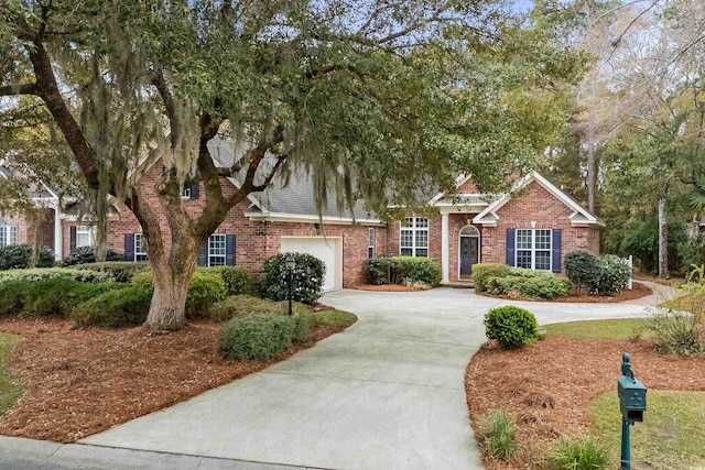 192 Berkshire Loop, Pawleys Island, SC 29585 - obstructed view of property with driveway and brick siding