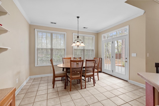 192 Berkshire Loop, Pawleys Island, SC 29585 - dining space with plenty of natural light, crown molding, a chandelier, and light tile patterned floors